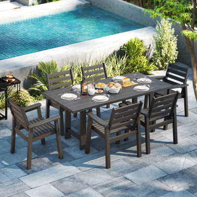 Ensemble de table de salle à manger 7 pièces en PEHD avec trou pour parasol Immie, noir Immie