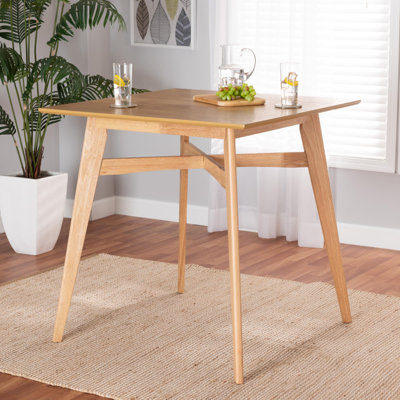 Lapinski Solid Wood Base Dining Table