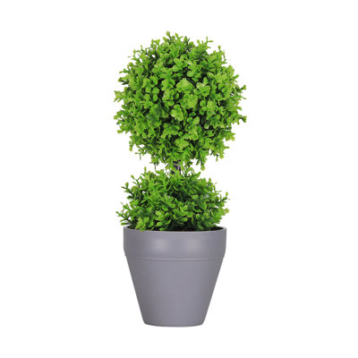 Plante artificielle verte simple en pot en pot gris