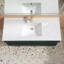Meuble-lavabo suspendu de 122 cm (L) x 53 cm (P) avec comptoir en pierre, éclairage DEL intégré, design cannelé à deux niveaux, tiroirs à fermeture amortie, vert