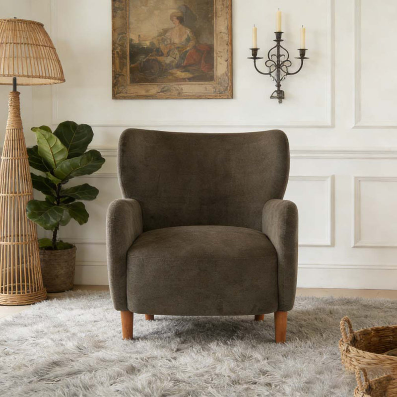 Fauteuil club rembourré à oreilles
