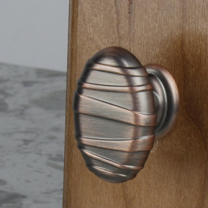 Mackinac Length Oval Knob, Antique Bronze with Copper
