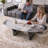 51" Modern Oval Coffee Table, Glossy Sintered Stone Table top With N-Shaped-Steel Base