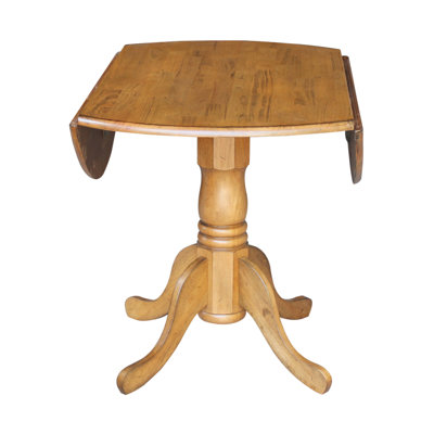 Philipston Extendable Round Solid Wood Dining Table
