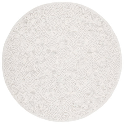 Jellisa Hand Tufted Wool/Cotton Geometric Rug in Ivory