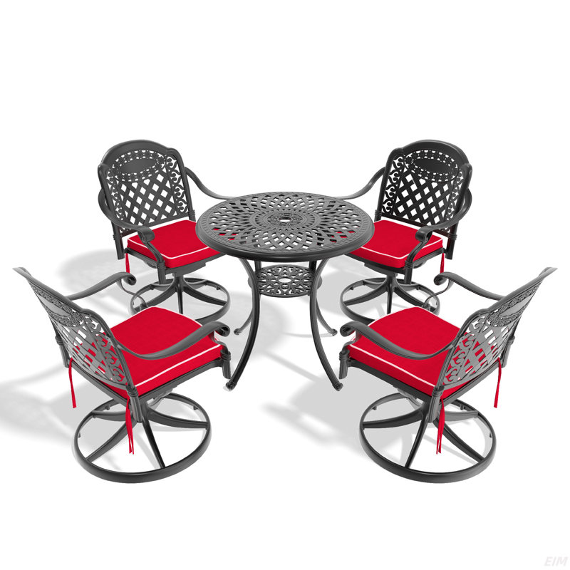 L'ensemble de salle à manger en fonte d'aluminium toutes saisons comprend des chaises pivotantes et une table avec un cadre noir