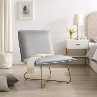 Chaise d'appoint rembourrée en velours avec pieds en métal