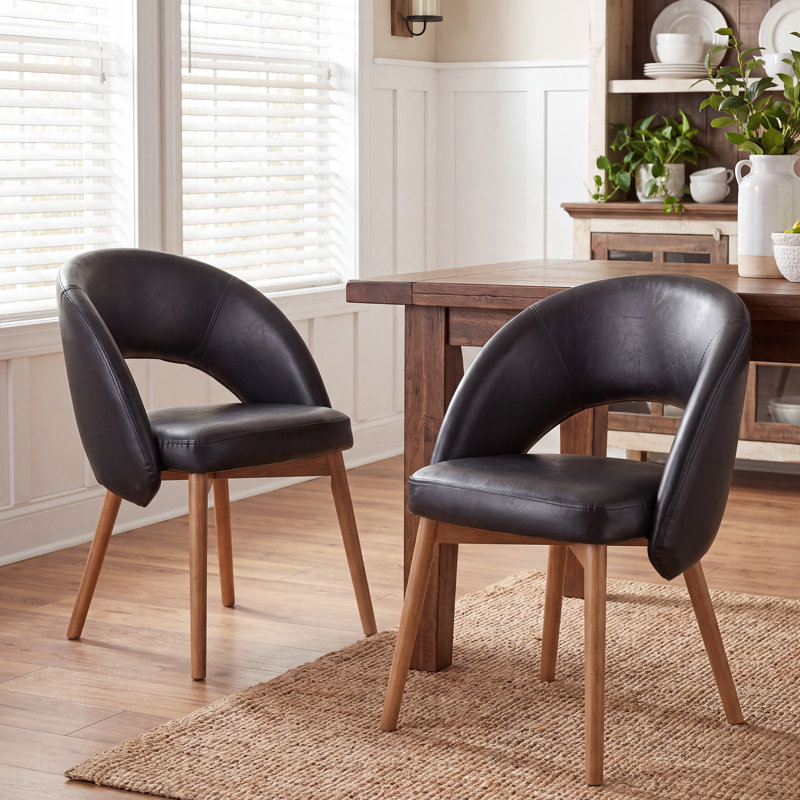 Chaises de salle à manger Aurevo de style moderne du milieu du siècle, revêtues de cuir noir, avec dossier incurvé et pieds en bois massif. Chaises de cuisine rétro pour salle à manger ou restaurant. Montage facile.