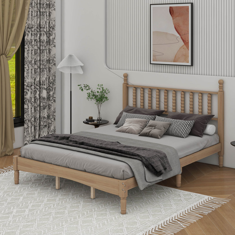 Grand lit plateforme en bois avec tête de lit en forme de gourde