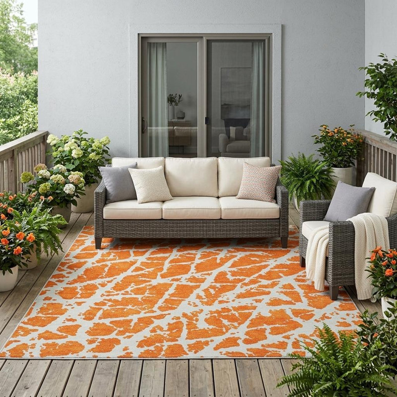 5' X 8' Orange and White Abstract Washable Non Skid Indoor Outdoor Area Rug