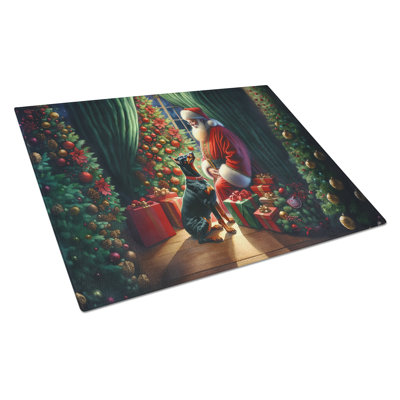 Doberman Pinscher and Santa Claus Glass Cutting Board