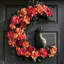 Décoration de porte d'Halloween en forme de couronne florale orange rouge rose