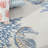 Baeza Animal Print Ivory/Blue/Red Area Rug-7296599