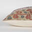 Coussin lombaire à motif rouge et beige