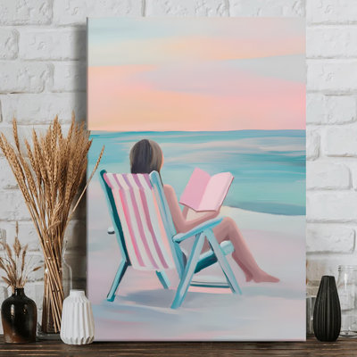 Art sur toile, "Femme lisant sur une chaise de plage" - vue sereine sur l'océan - Toile tendue de 1 po de profondeur - 24 po x 36 po