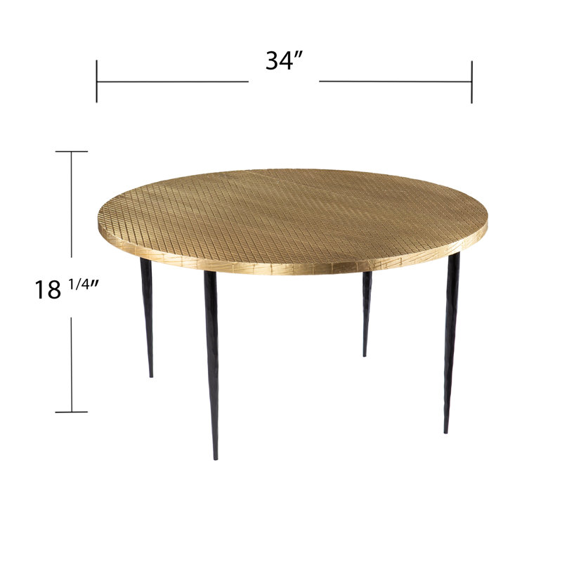 Table basse ronde avec plateau en relief
