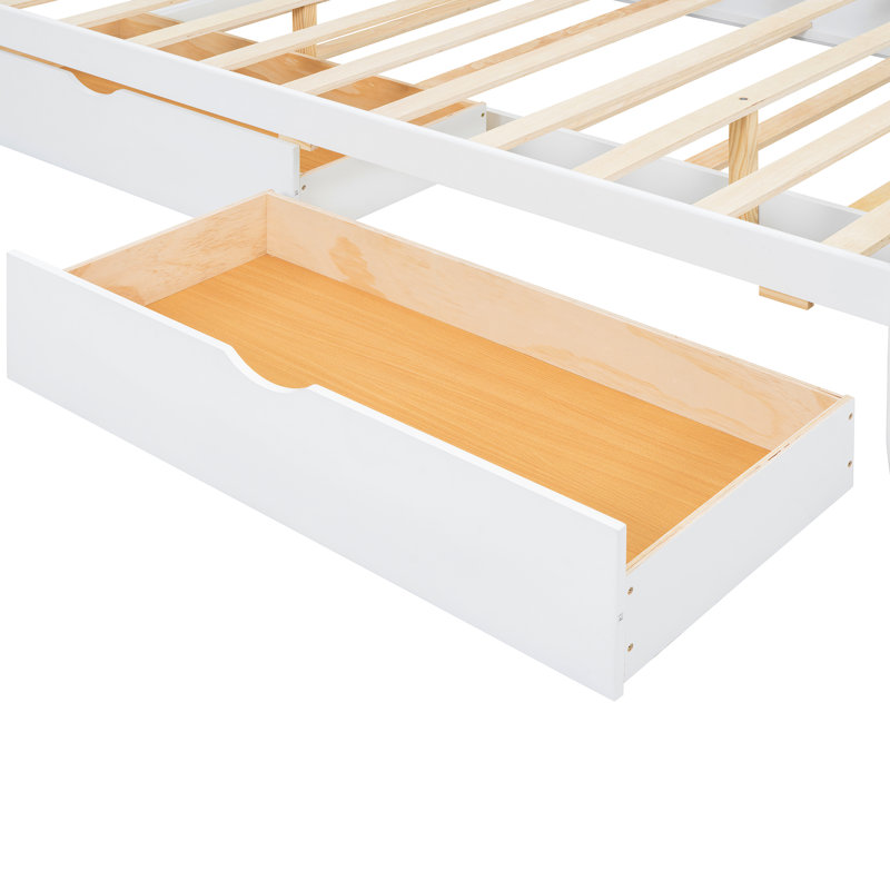 Grand lit blanc avec lit gigogne simple TG et 2 grands compartiments de rangement.