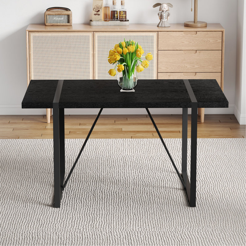 A 55-Inch Minimalist Retro Rectangular Dining Table With A Black Textured Top With Inset Rectangular Black Metal Legs.Minimalist MDF Tabletop.Meeting Various Purposes Such As Dining And Working.