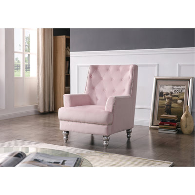 Charmant fauteuil traditionnel à accoudoirs ronds