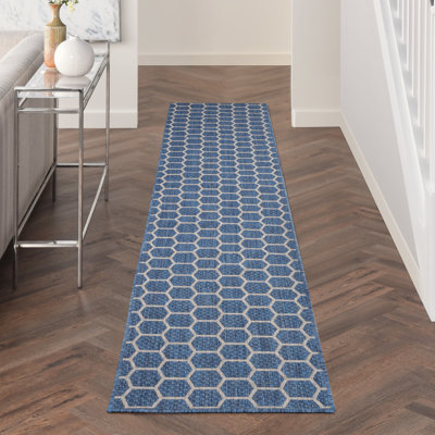 Tapis intérieur / extérieur à motif géométrique réversible bleu Canete