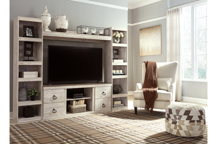 large gray entertainment center in a traditional-style living room