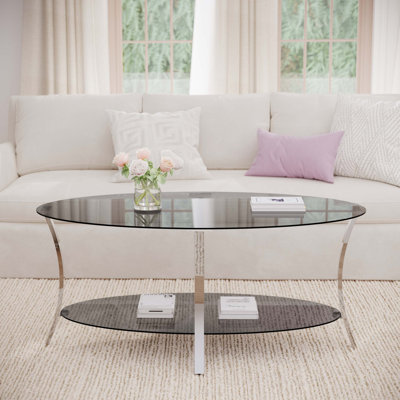 Table basse moderne ovale en verre avec rangement double couche et structure en métal robuste pour le décor du salon