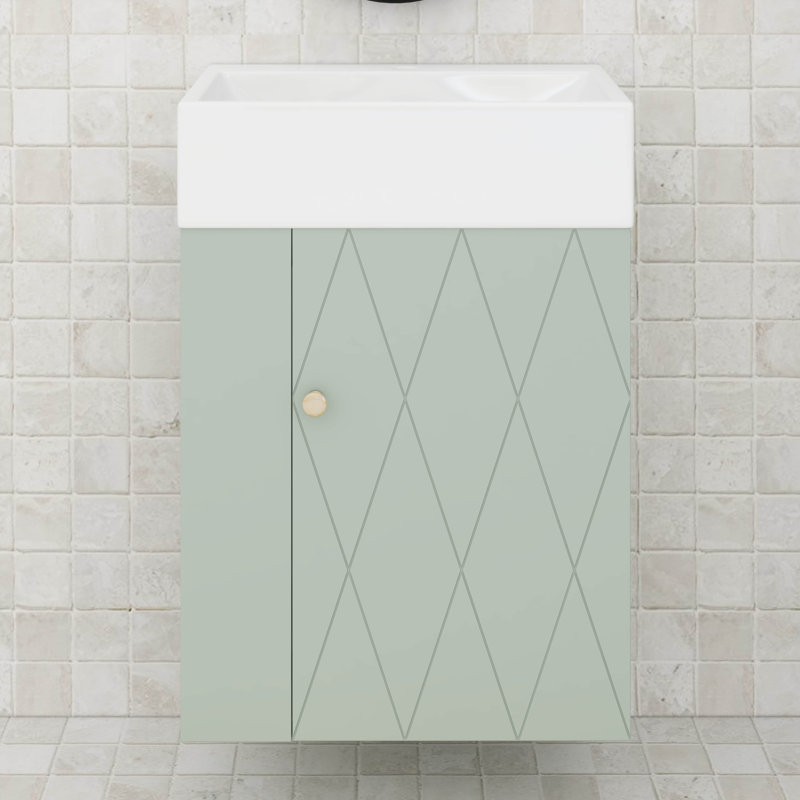 Meuble-lavabo de 20 po avec lavabo en céramique, porte à motif de losanges, poignées et tablettes de rangement latérales