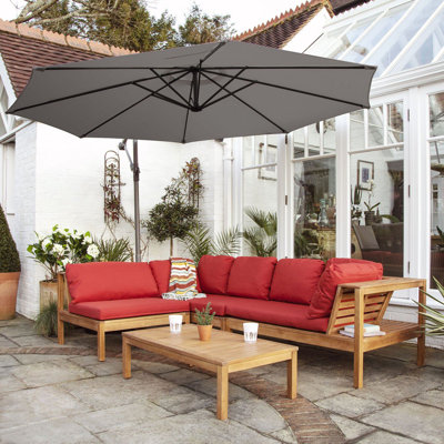 Collinward 5 - Person Seating Group with Red Cushions and Round Grey Parasol
