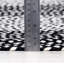 Tapis noir / blanc tressé à la main Enika-847346323