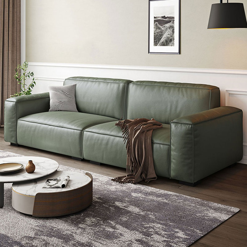 Canapé modulaire vert en cuir véritable