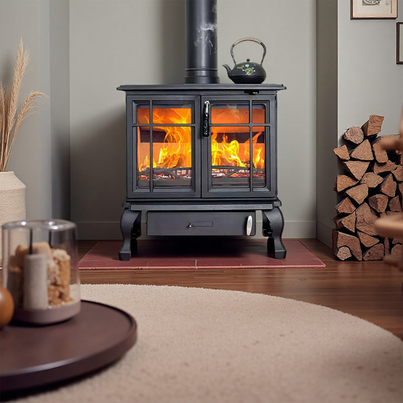 Real firewood heating room with cast iron fireplac
