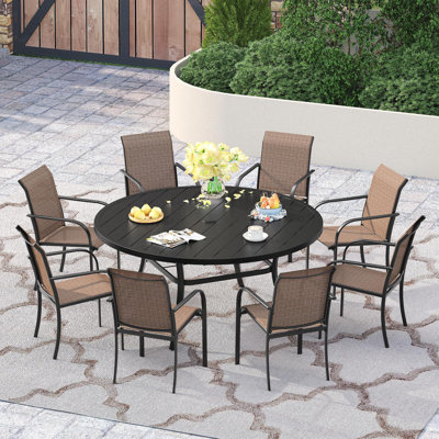 60" Patio dining set with Metal Round Dining Table and Stackable Armrest Dining Chairs by Red Barrel Studio