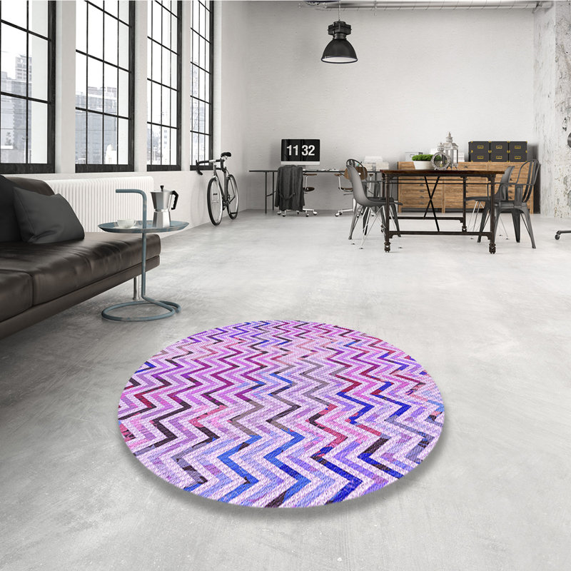 Tapis rond mauve tissé à la machine 8 pi