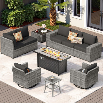 Ensemble de patio 7 pièces en osier avec coussins, chaises berçantes pivotantes et foyer d'extérieur pour 7 personnes