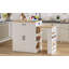 Console d'îlot extensible avec tiroirs, armoire à deux portes et tablettes ouvertes. Sert de table de salle à manger, de bar pour le petit-déjeuner temporaire et de salon de thé l'après-midi