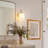 1-Light Oval Glass Armed Wall Sconce