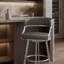 Tabouret de bar rotatif Dehn avec dossier ouvert et repose-pieds en métal et similicuir Dehn-450133325-450133324-437208171