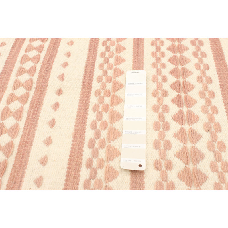 Tapis ivoire / rose en laine à motif géométrique Ellington