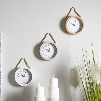 Abdur Wood Wall Clock