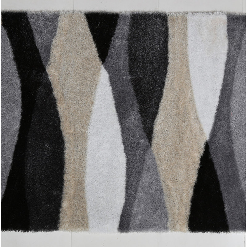 Soft Area Rug With Abstract Design