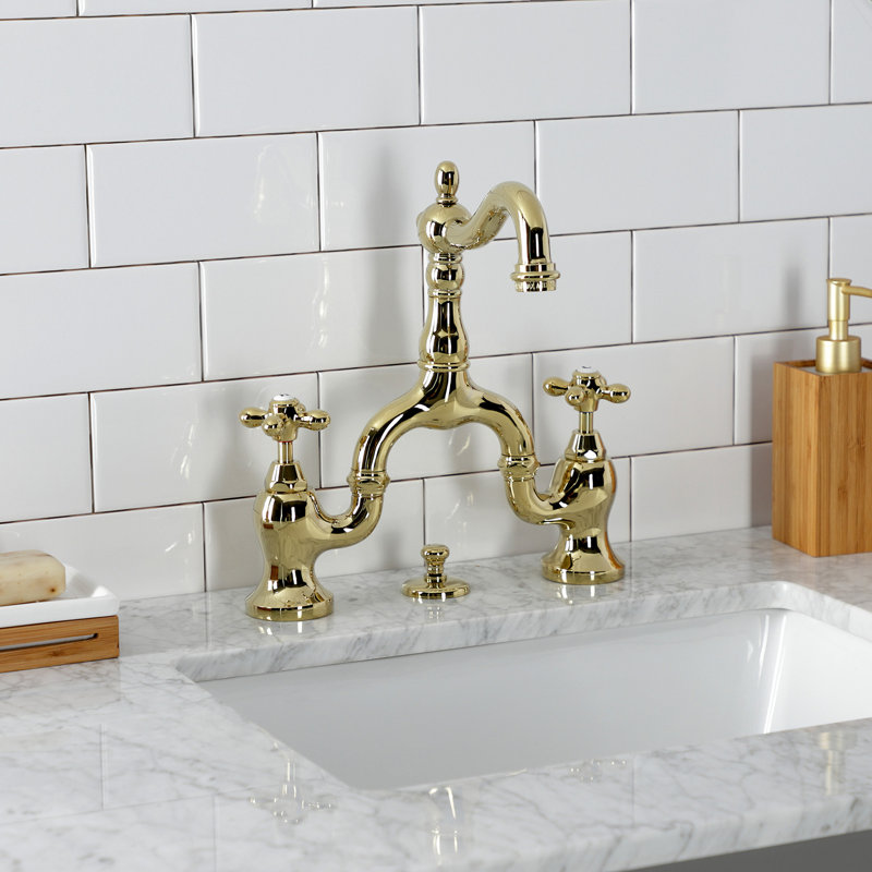 Kingston Brass English Country Two-Handle 3-Hole Deck Mount Bridge Bathroom Faucet with Brass Pop-Up, Polished Brass