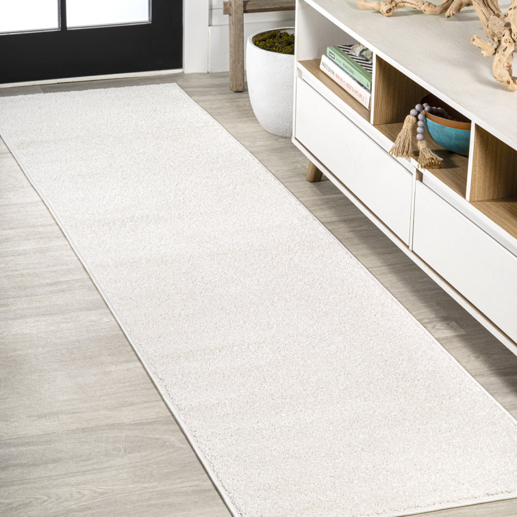 Arcie Solid Low-Pile Ivory Rug