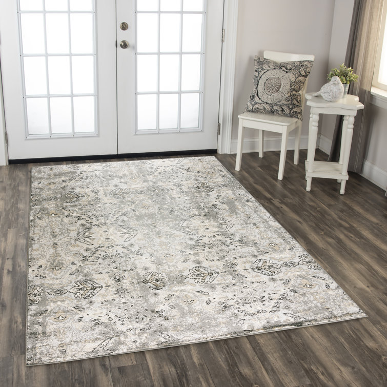 Tapis géométrique beige / gris / noir