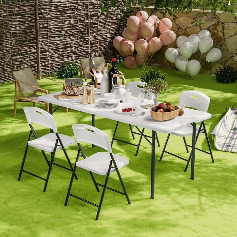 Tashawna 4 - Person Patio Dining Set with Rectangular Table