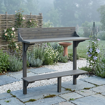 Table de bar d'extérieur fabriquée en bois d'acacia, avec une finition grise. Conçu pour être placé sur un balcon.