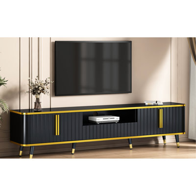 Meuble télé minimaliste pour téléviseurs de 85 po, construction, accents noirs et or, avec tablette de rangement élégante et élégante, garniture dorée, construction