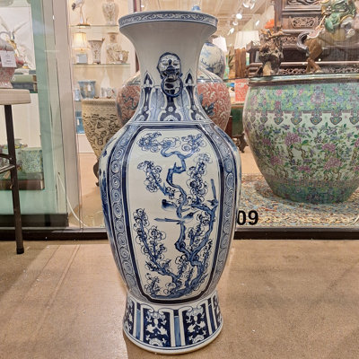 Vase de sol en porcelaine bleue et blanche à motif floral des Quatre Saisons