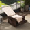 Fauteuil inclinable pivotant pour l'extérieur en osier, dossier inclinable, repose-pieds relevable, coussins de base rotatifs à 360 ° et résistants à l'eau pour le patio, blanc crème