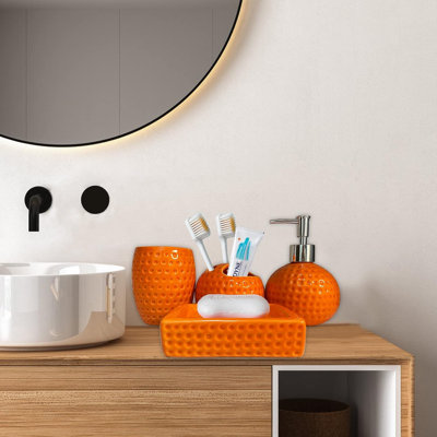 Bathroom accessory set in orange