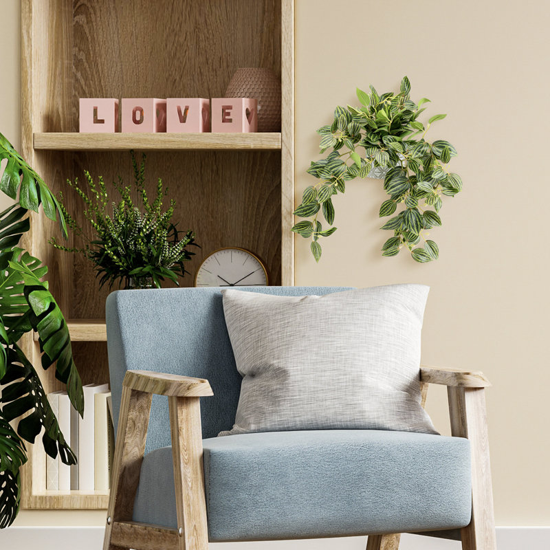 Fausse plante artificielle en pot de ciment